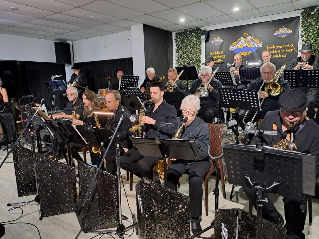 Hint of Swing Big Band playing at the Condong Bowling Club, saxophones in front and brass behind